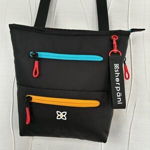 Sherpani Black Crossbody Bag with Blue, Red, and Orange Accents